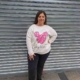 Estilo Casual  Color: Tonos Blancos, Plateados y Rosas.  Detalles: Sudadera Blanca de pana fina de manga larga y con dibujo rosa en la parte central.  Composición: 95% Viscosa 5% Elastano Talla Única, adecuada apróx. 46/48